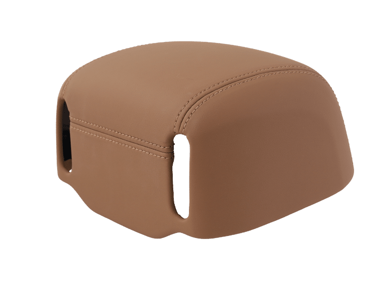 Sheathed rear headrest shell